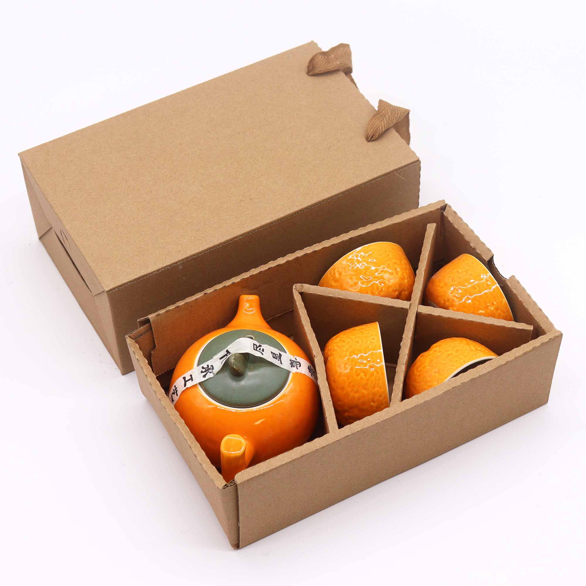 Teeset „Kräuter-Orange“ mit Teekanne und vier Schalen in Geschenkbox, Keramik in Orange und Weiß