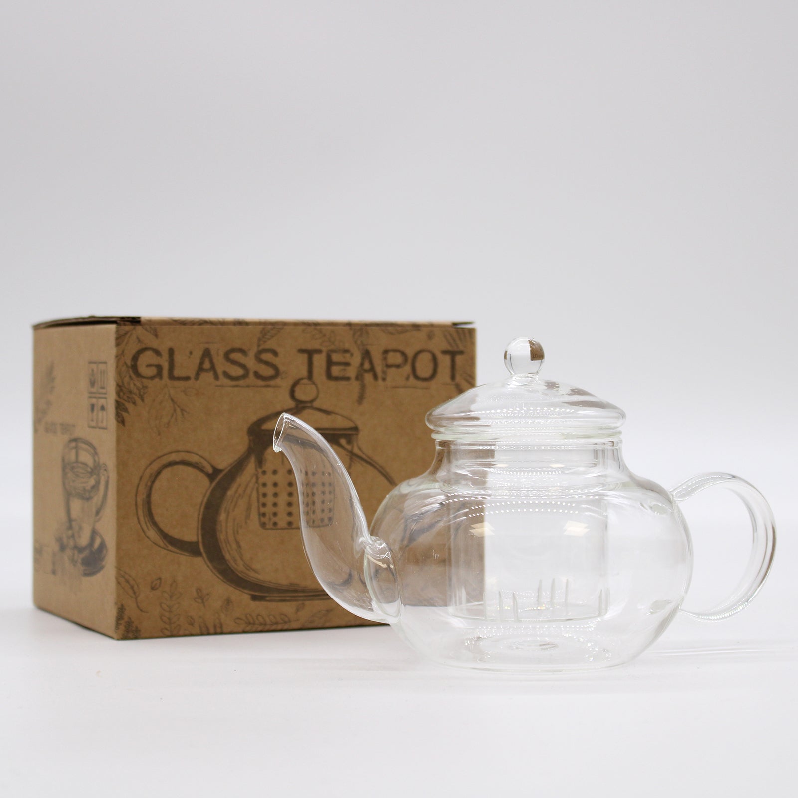 Transparente Glasteekanne Round Pearl mit Glasfilter – 400 ml, beim Ausgießen von rotem Tee
