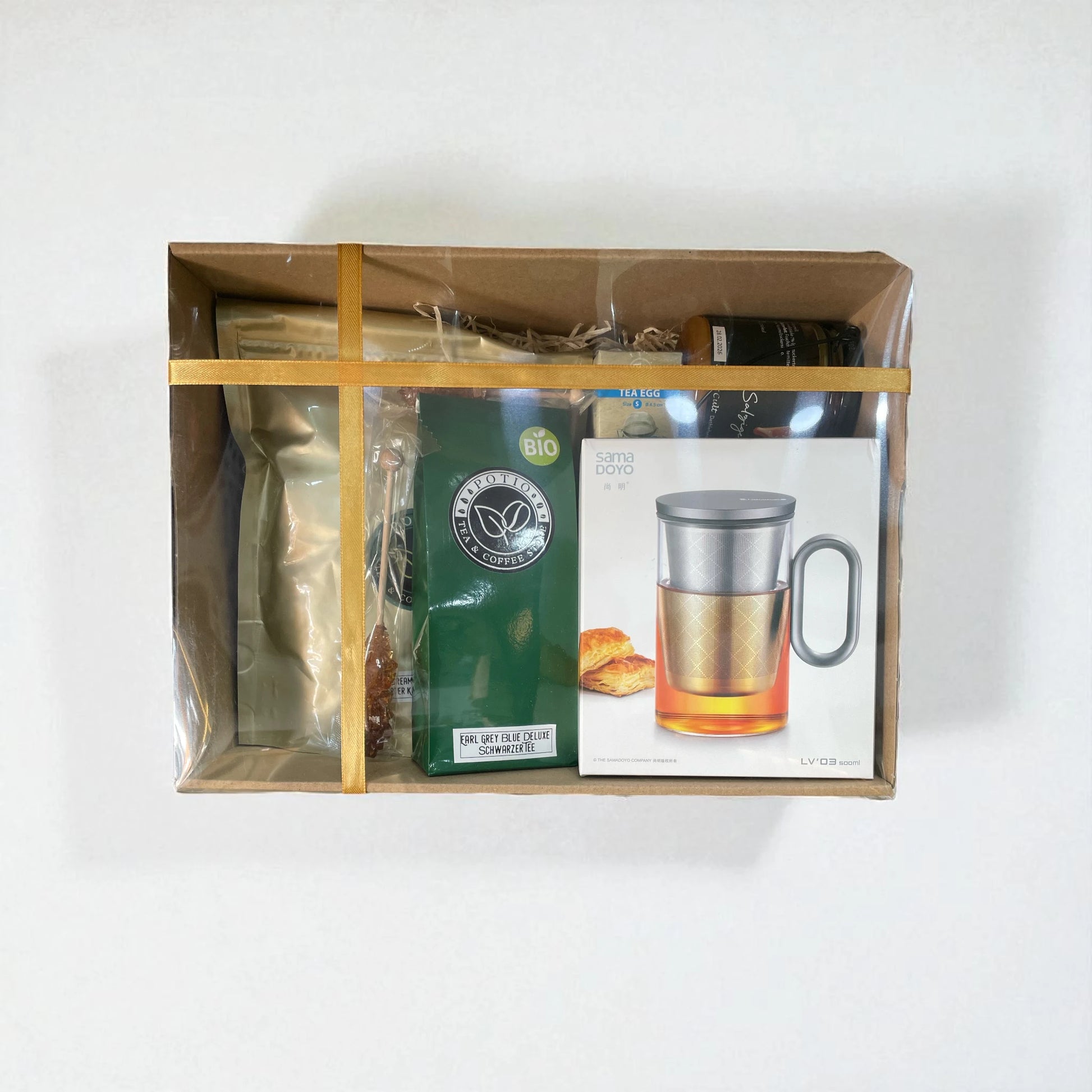 Geschenkbox mit Teekanne, Earl Grey Tee, Kaffee und Honig